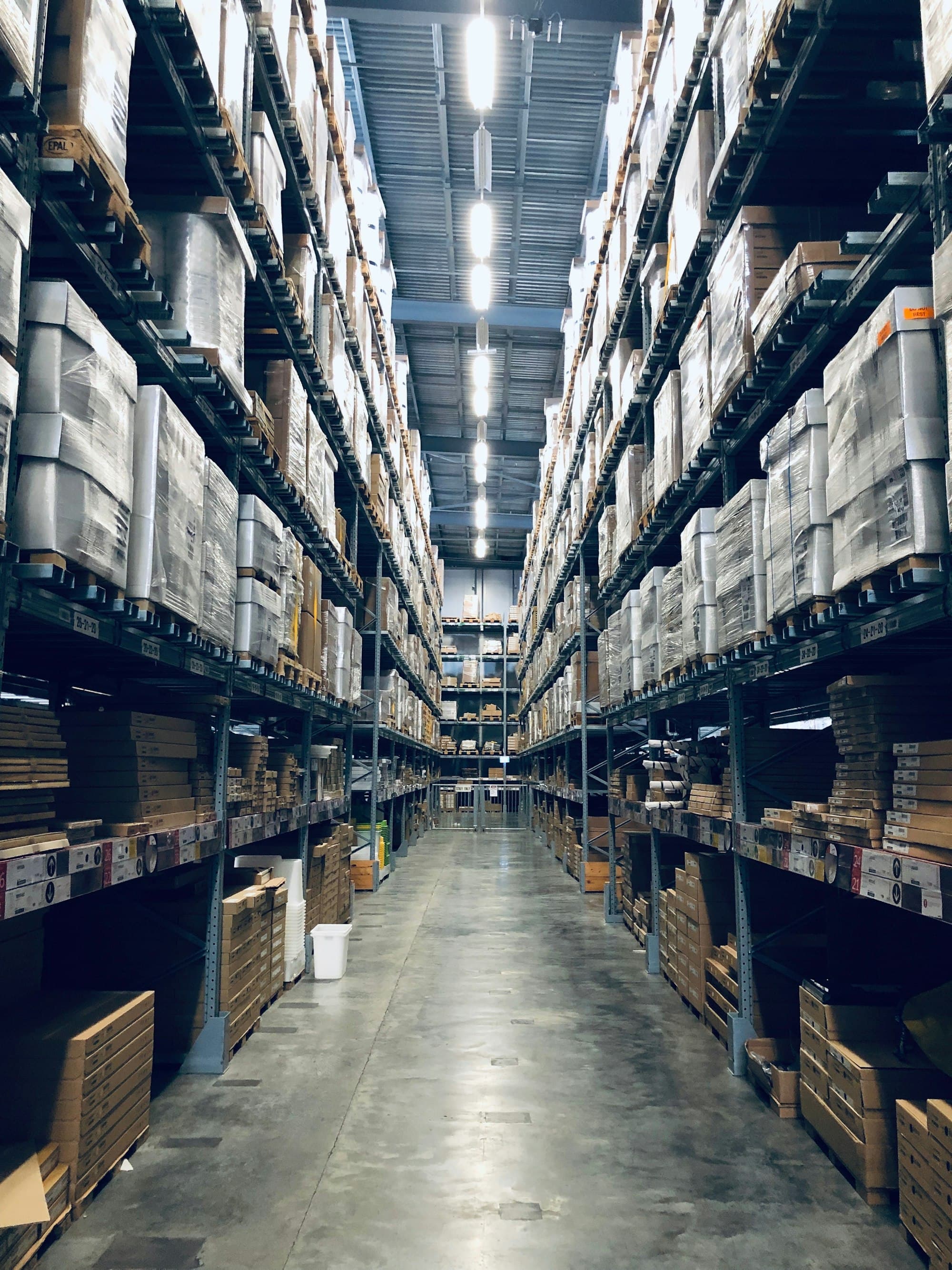 Warehouse inventory illustrating order quantity and bulk procurement